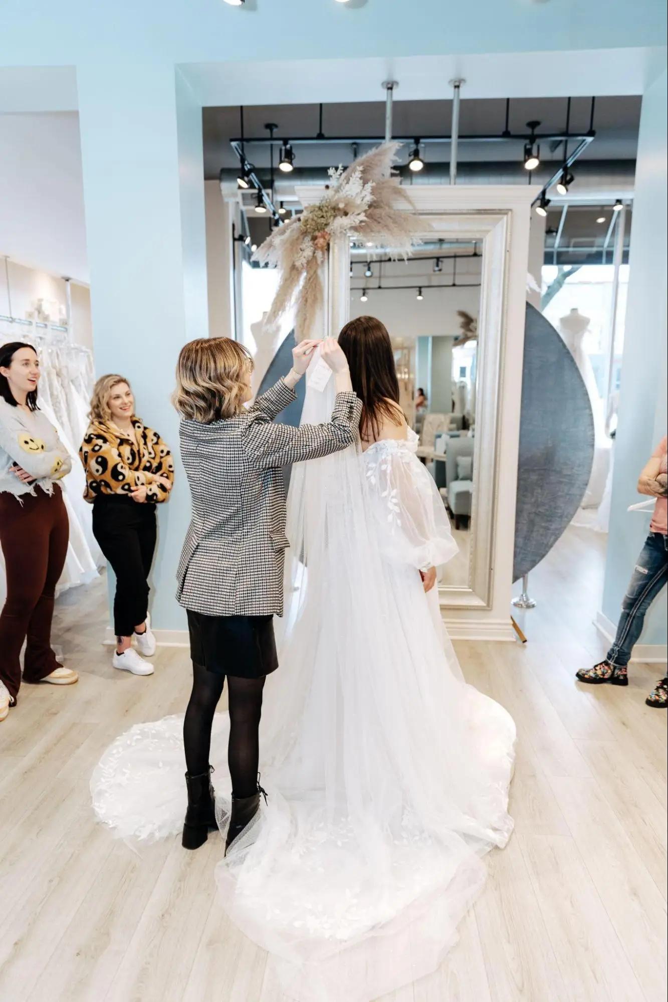 Belle Amour bridal stylist assisting bride during her appointment