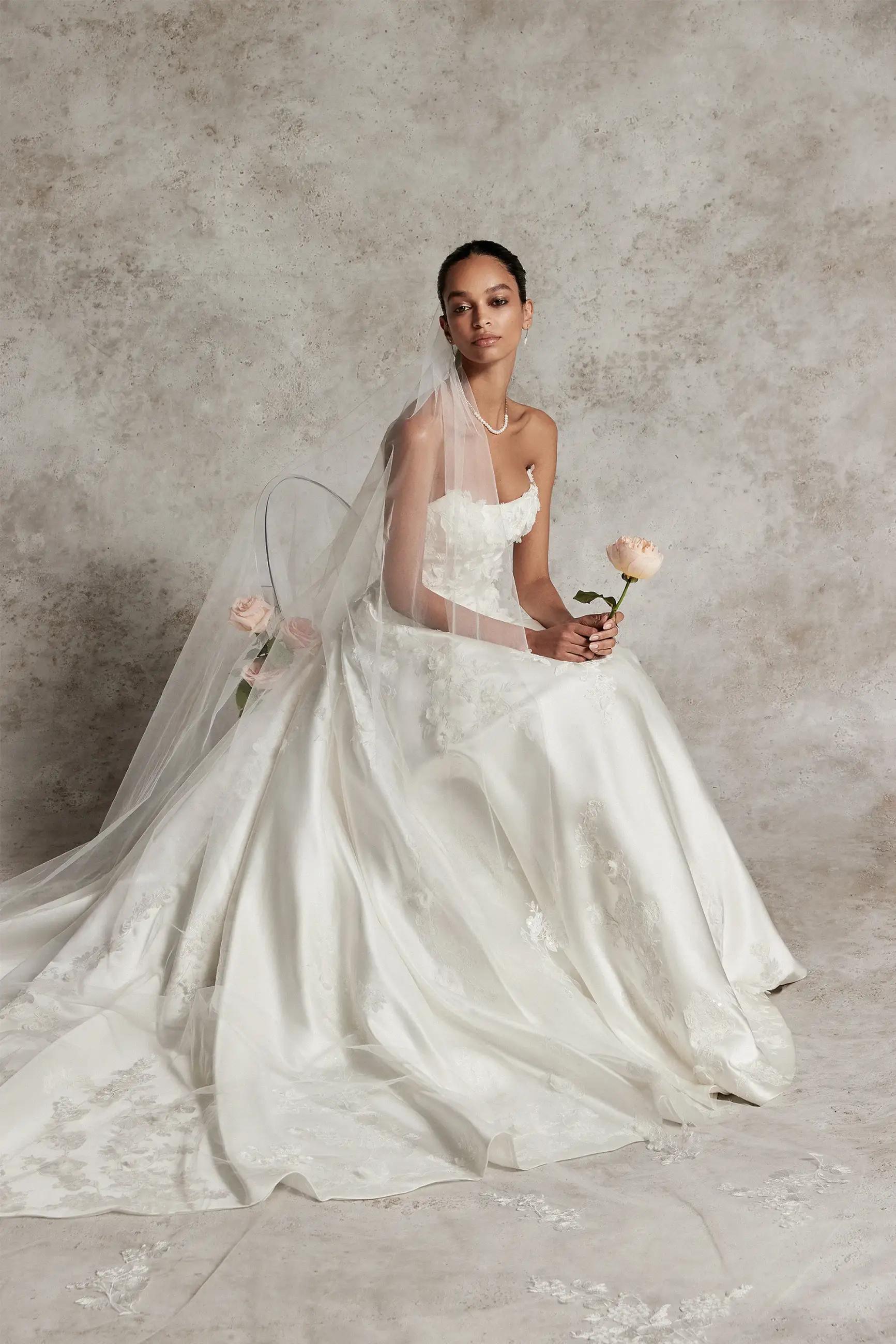 Model wearing a white gown