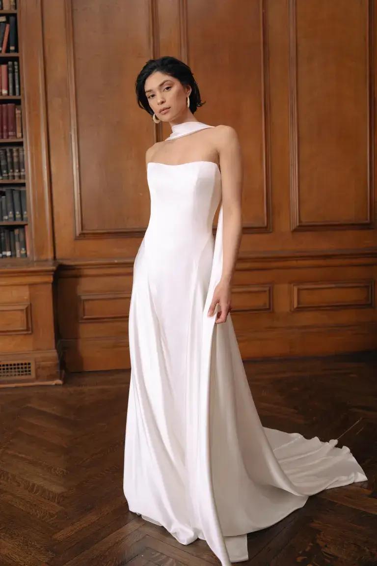 Model wearing a white gown