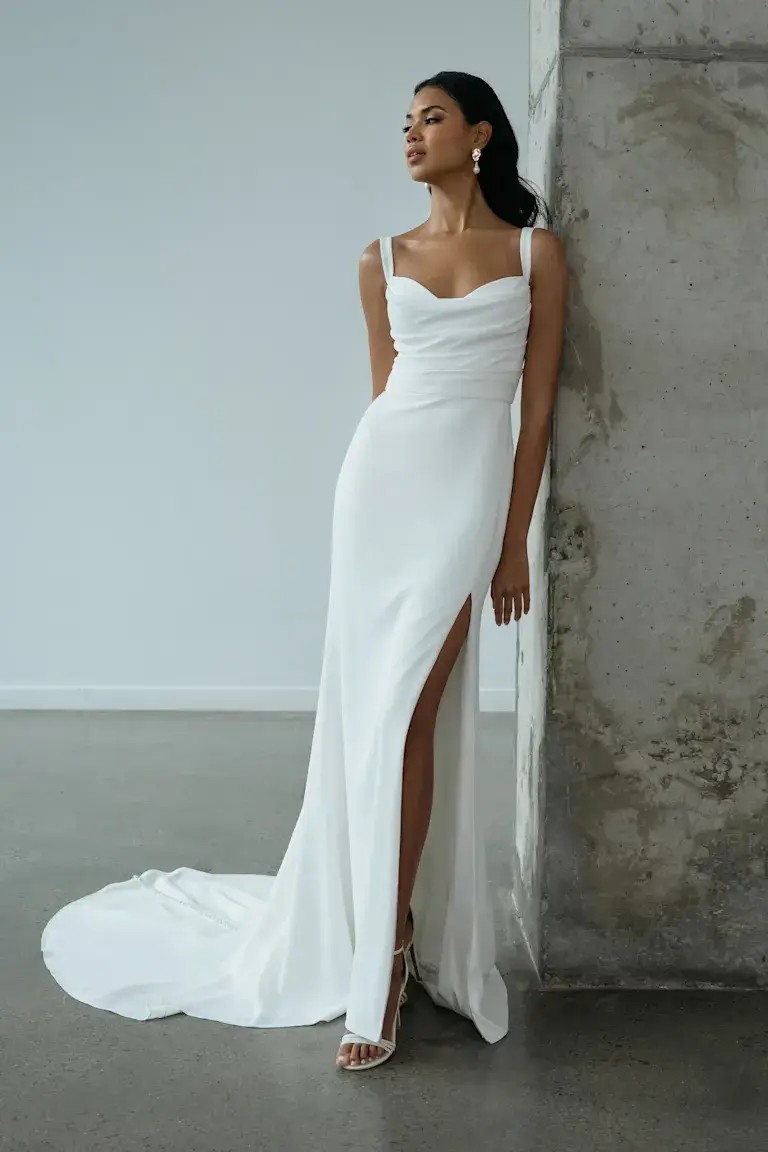 Model wearing a white gown